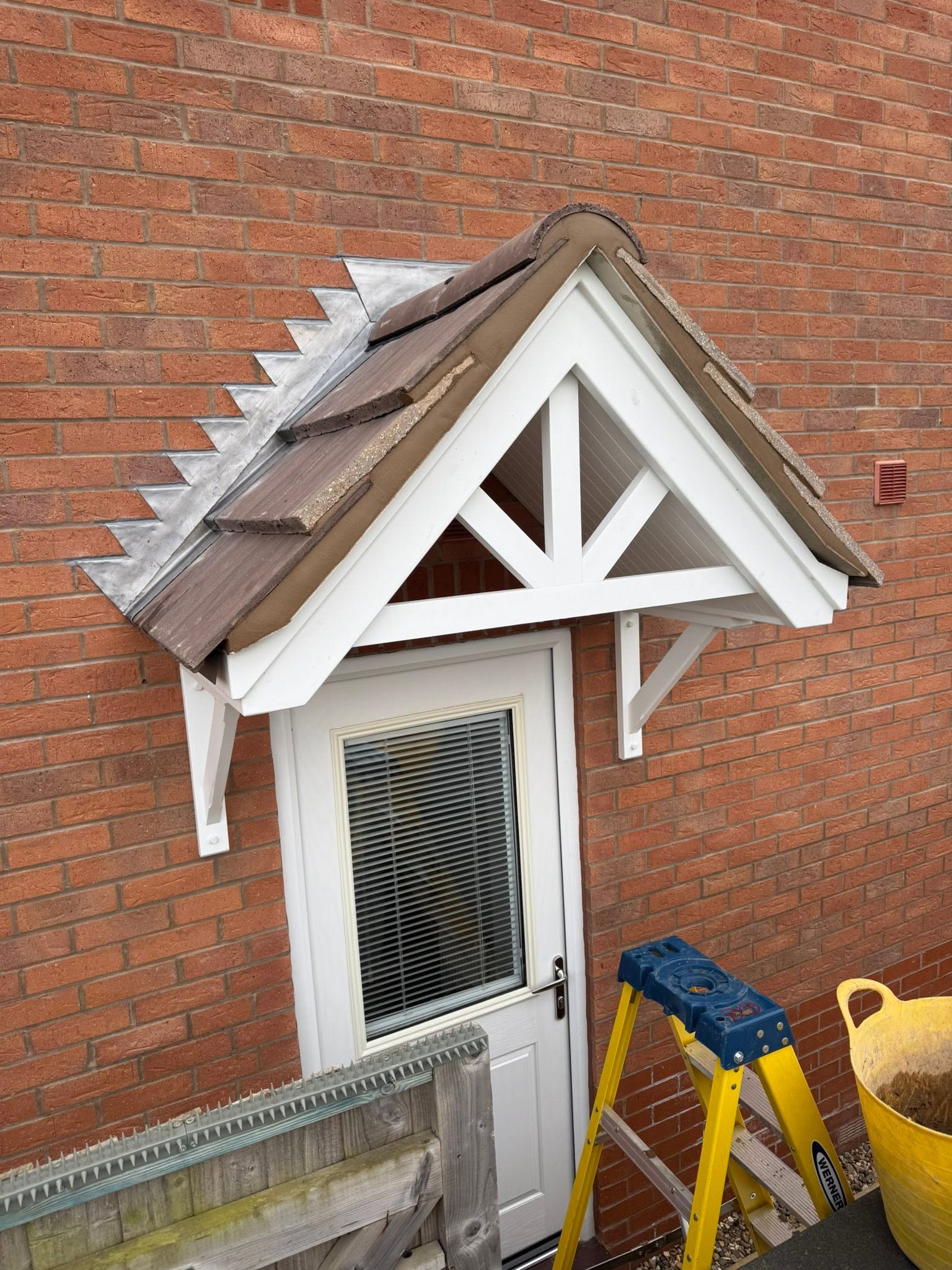 Porch canopy roof with newly installed leadwork — S Quinlan Roofing, Warwickshire
