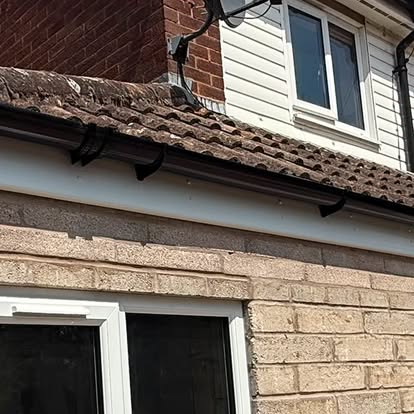 New white UPVC fascias, soffits and black guttering installed — S Quinlan Roofing, Warwickshire