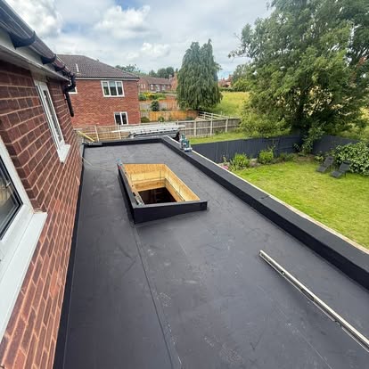 EPDM rubber flat roof with glazed lantern opening — flat roofing specialist, Warwickshire